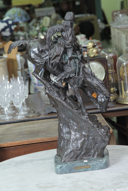 Appraisal: BRONZE MOUNTAIN MAN SCULPTURE AFTER FREDERICK REMINGTON On a marble