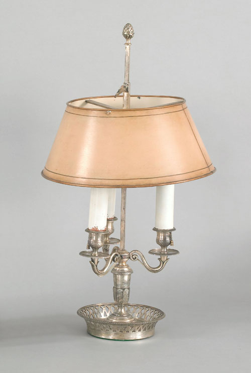 Appraisal: French silvered metal bouillotte lamp having a rod standard and