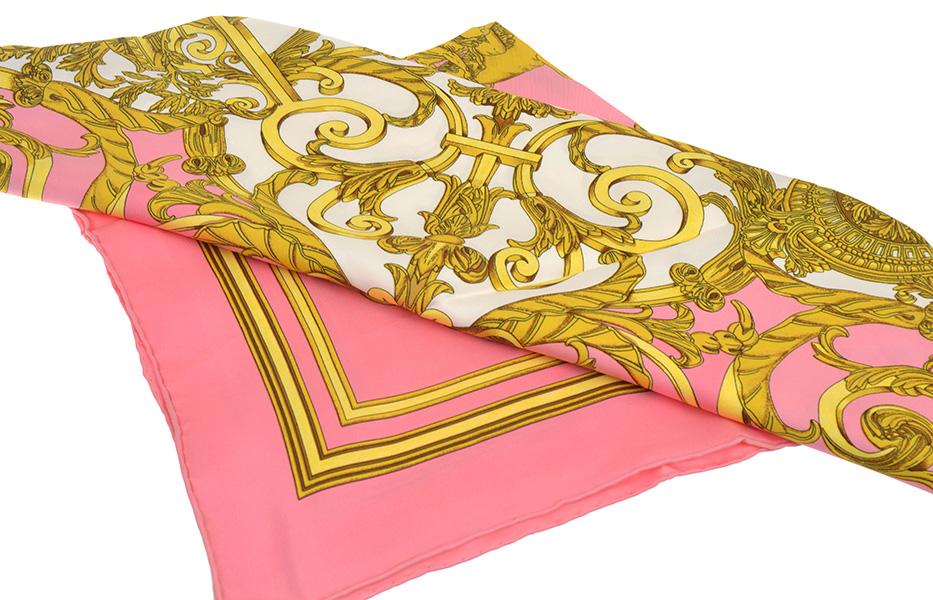 Appraisal: A SILK SCARF BY HERMES 'Les Tuileries' design depicting gold