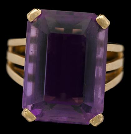 Appraisal: karat yellow gold amethyst cocktail ring Emerald cut amethyst prong