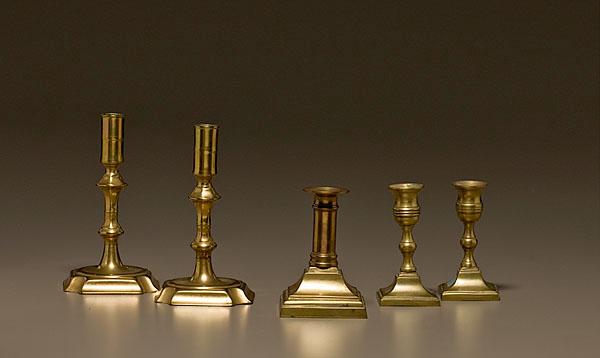 Appraisal: BRASS ENGLISH CANDLESTICKS lot of ca - Includes a pair