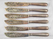 Appraisal: Six silver fish knives with pierced and engraved blades silver