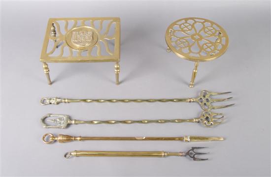 Appraisal: A Collection of English Brass Fireplace Implements Length of longest