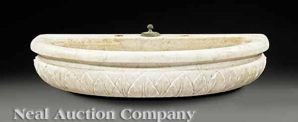 Appraisal: An Antique White Marble Demilune Grotto Basin th c thick