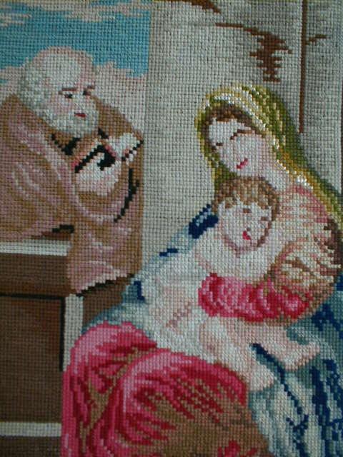 Appraisal: An early thC woolwork panel depicting Madonna and child with