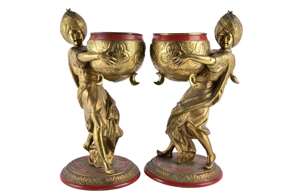 Appraisal: PAIR OF GILT METAL FIGURAL CACHEPOTSwith red paint and brass