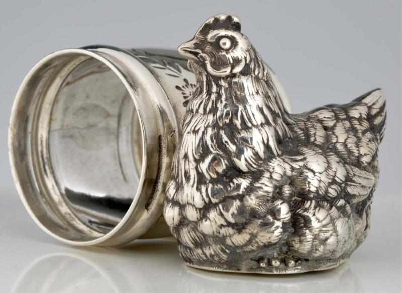 Appraisal: Sitting Hen by Holder Figural Napkin Ring By Meriden Britannia