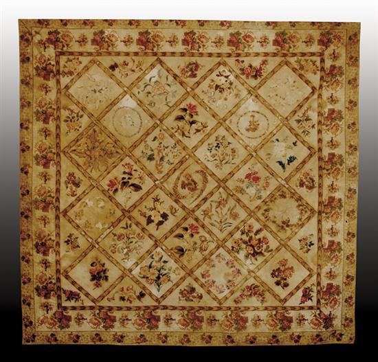 Appraisal: American stippled quilt circa appliqued floral chintz design in browns