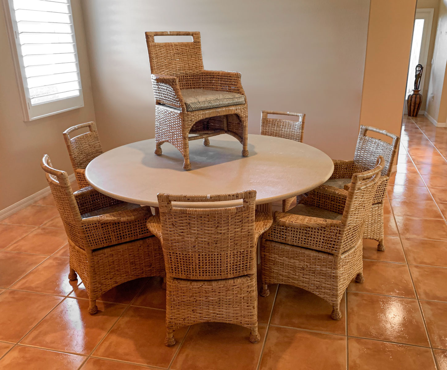 Appraisal: MCGUIRE CHAIRS AND TABLE Comprising - McGuire Rattan armchairs -