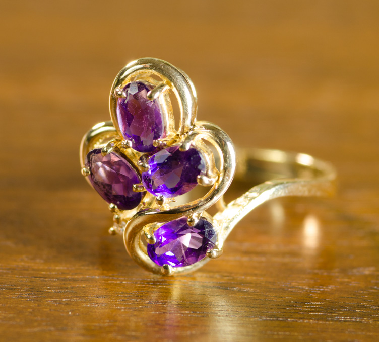 Appraisal: AMETHYST DIAMOND AND FOURTEEN KARAT GOLD RING set with one