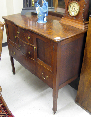 Appraisal: LATE VICTORIAN OAK BUFFET American c having a beveled mirror