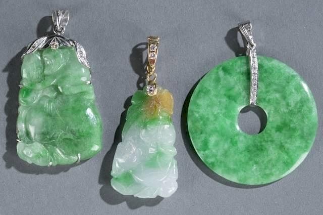 Appraisal: diamond and jade pendants A group of diamond and jade