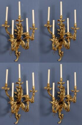 Appraisal: SET OF FOUR LOUIS XV-STYLE GILT BRONZE FIVE-LIGHT WALL APPLIQU