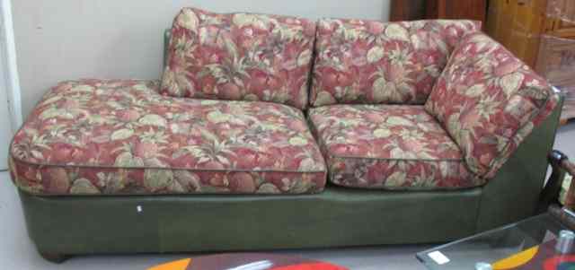 Appraisal: GREEN LEATHER AND TROPICAL TAPESTRY SECTIONAL SOFA SET recent the