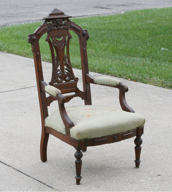 Appraisal: Victorian carved chair with needlepoint seat intricate open work on