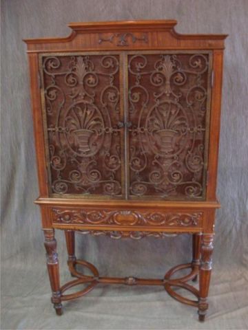 Appraisal: Carved Silver Chest with Metal Doors and Stained Glass From