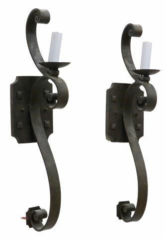 Appraisal: pair Large wrought iron wall sconces th c having studded