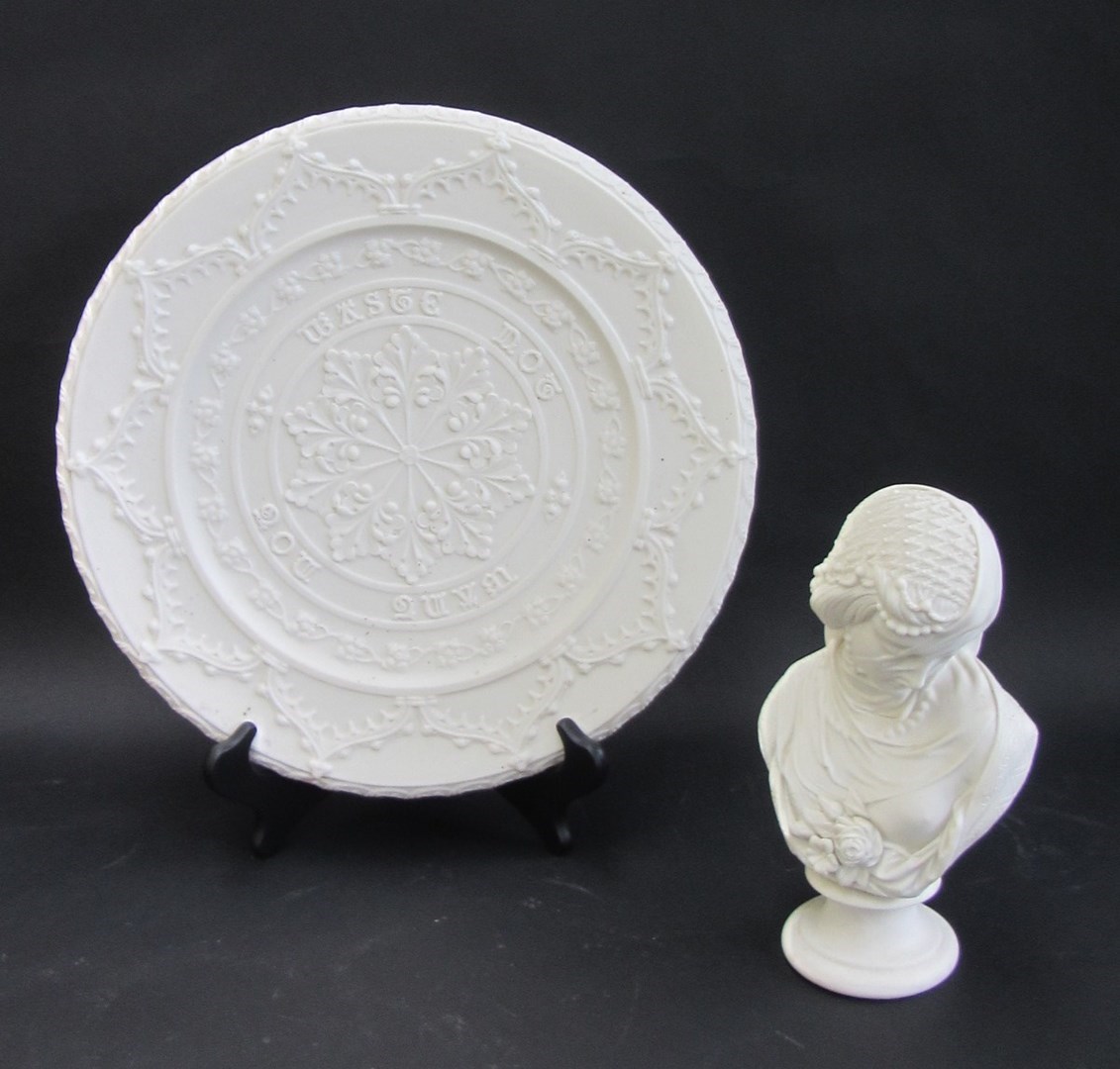 Appraisal: A Worcester parian plate of Victorian Gothic revival style centred