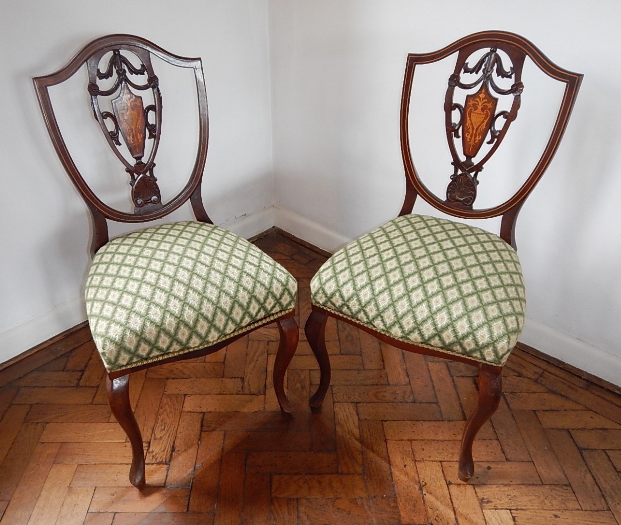 Appraisal: A pair of late Victorian inlaid mahogany single chairs with