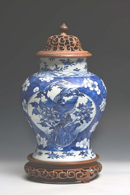 Appraisal: A CHINESE BLUE AND WHITE BALUSTER VASE with panels of