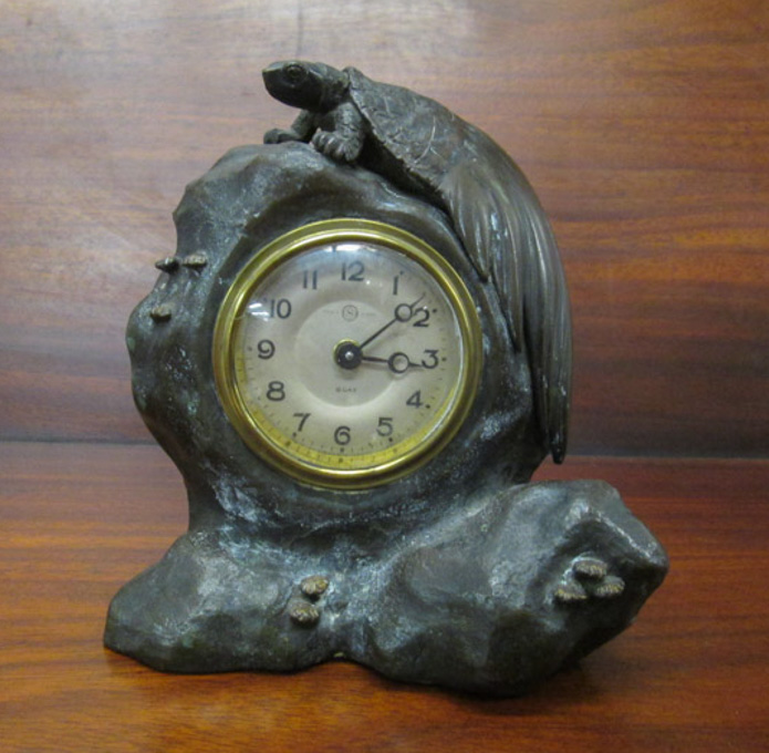 Appraisal: EARLY TH CENTURY JAPANESE MEJI PERIOD BRONZE CLOCK surmounted by