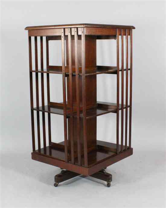 Appraisal: An Edwardian inlaid mahogany revolving bookcase ft in x ft