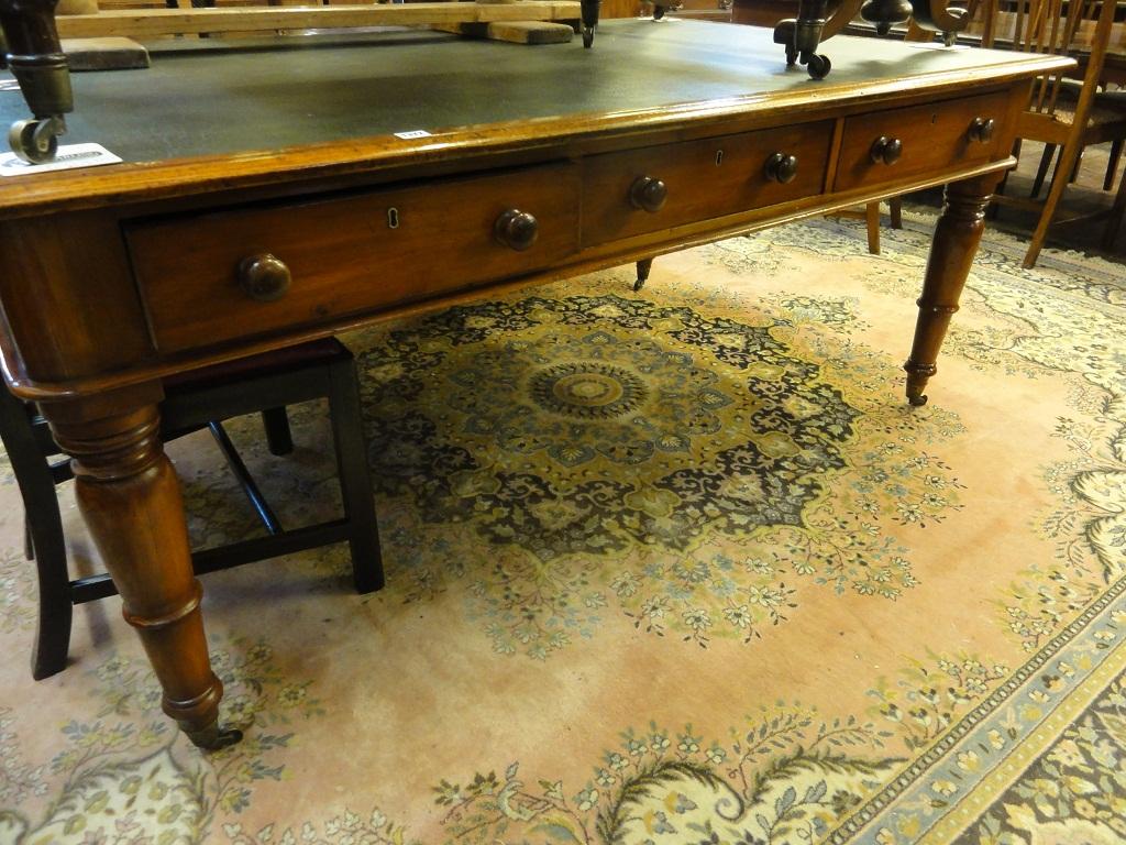 Appraisal: A Victorian library table of mixed wood construction with inset