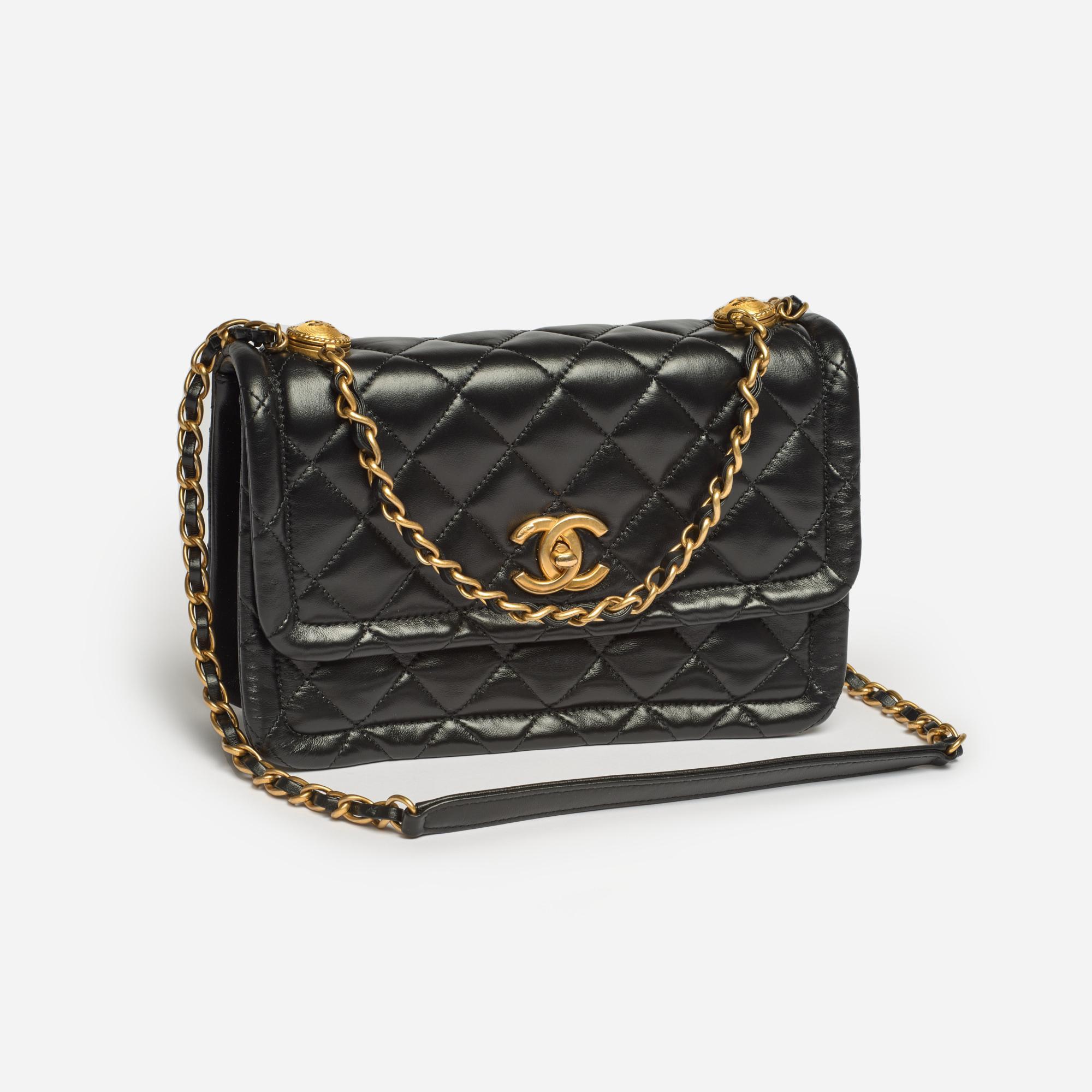 Appraisal: CHANEL SHINY BLACK LAMBSKIN FLAP CLUTCH W CHAIN A like