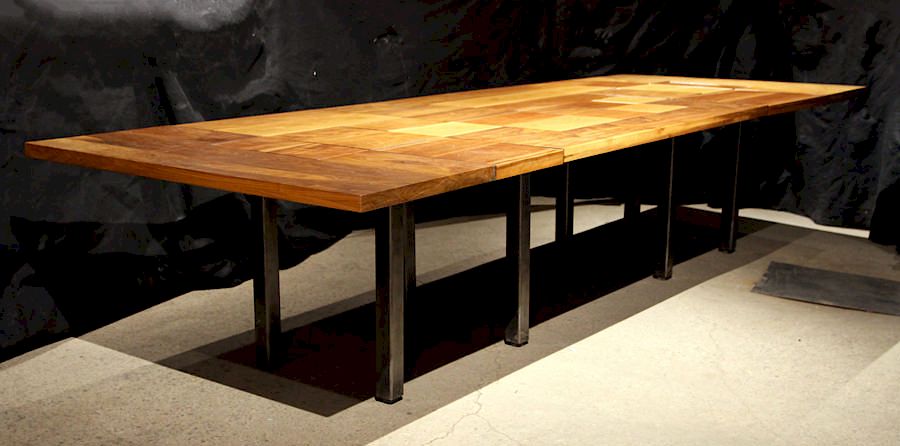 Appraisal: NORBERT KIMMEL DINING TABLE CHERRY WALNUT TOP A large iron