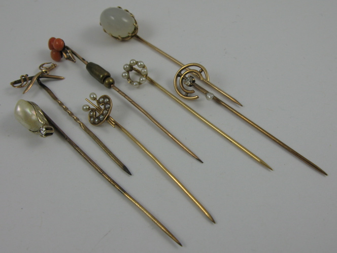 Appraisal: SEVEN YELLOW GOLD HAT PINS K and K yellow gold