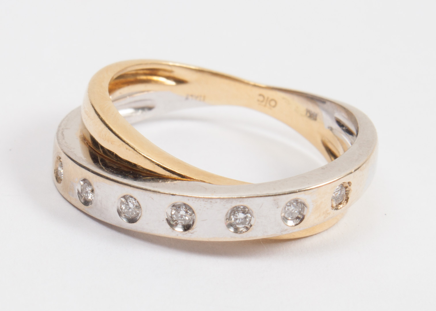 Appraisal: Two-tone K white and yellow gold diamond ring size grams