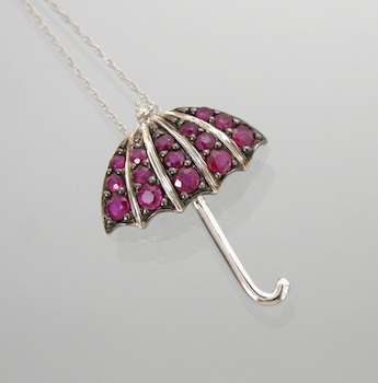 Appraisal: A Charming Ruby and Diamond Parasol Pendant k white gold