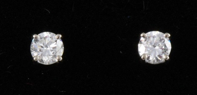 Appraisal: KW diamonds earrings Each earring contains one single diamond together