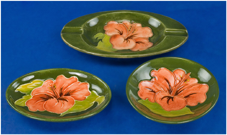 Appraisal: Three Moorcroft dishes Hibiscus design green background