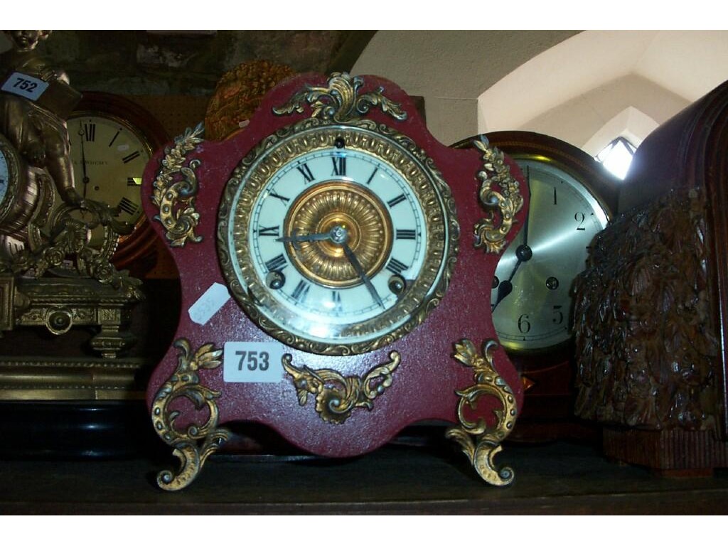 Appraisal: A late th century American mantle clock painted metal case