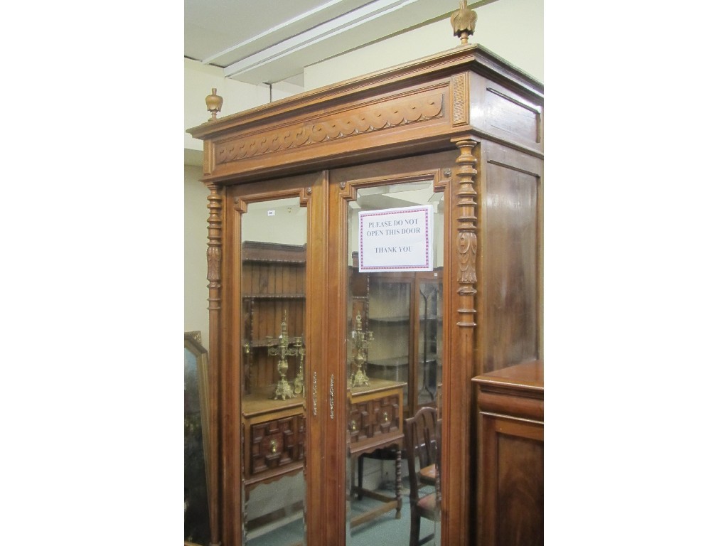 Appraisal: Mahogany armoire with mirrored drawers