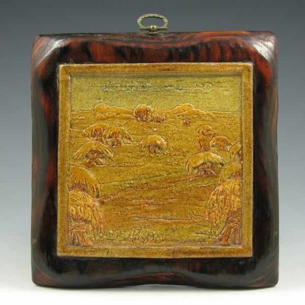 Appraisal: Scenic tile or trivet of a hay field attached to