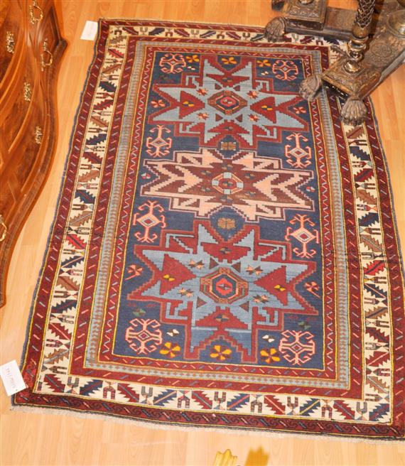 Appraisal: KARS KAZAK old Blue ground with three star-shaped medallions white