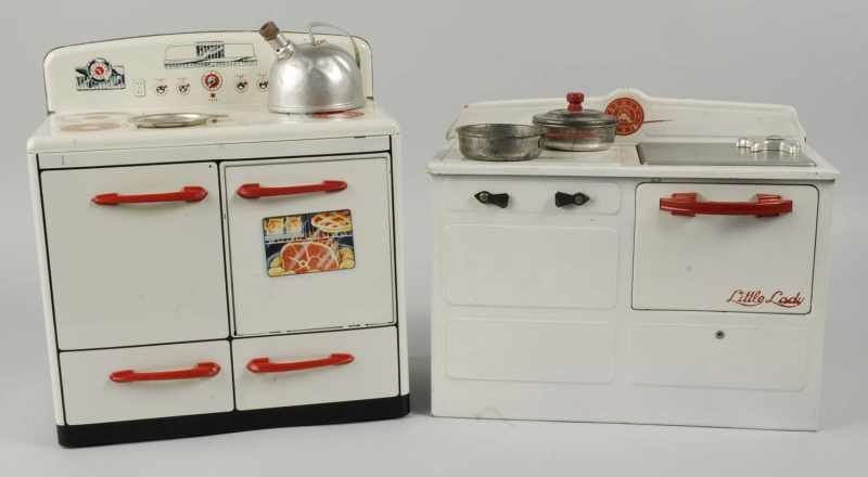 Appraisal: Lot of Tin Children's Stoves Description Includes one Royal one