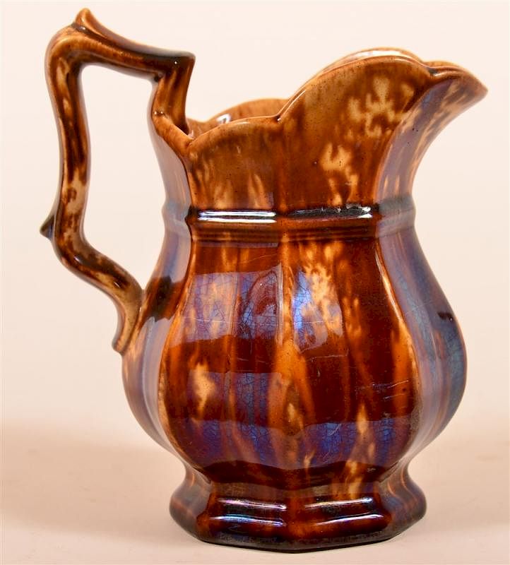 Appraisal: Signed Rockingham Glazed Yellowware Pitcher Signed Rockingham Glazed Yellowware Cream