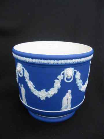 Appraisal: Wedgwood Jasperware Jardiniere dark blue classical figures garland dark blue