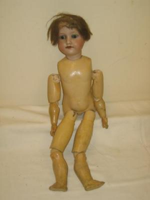 Appraisal: An Armand Marseille bisque head doll with brown short wig