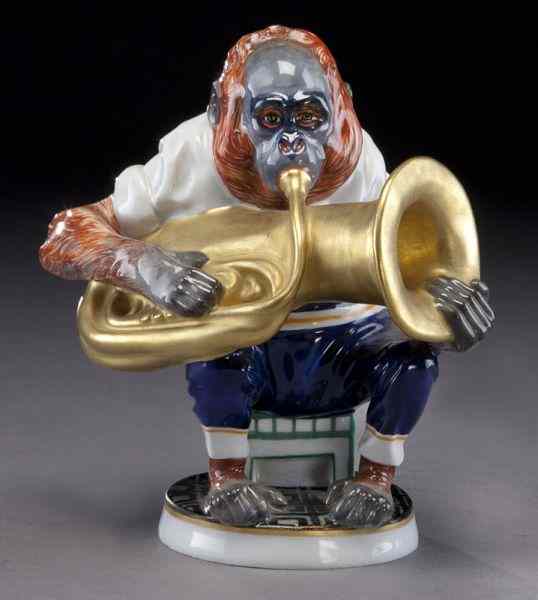 Appraisal: Meissen porcelain orangutan seated playing a tuba modeled by Otto