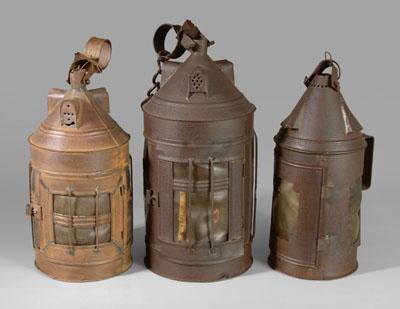 Appraisal: Three tin lanthorns lanterns all with horn windows three pierced