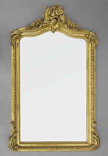 Appraisal: Louis XV style gilt rococo mirrorhaving a foliate arched top