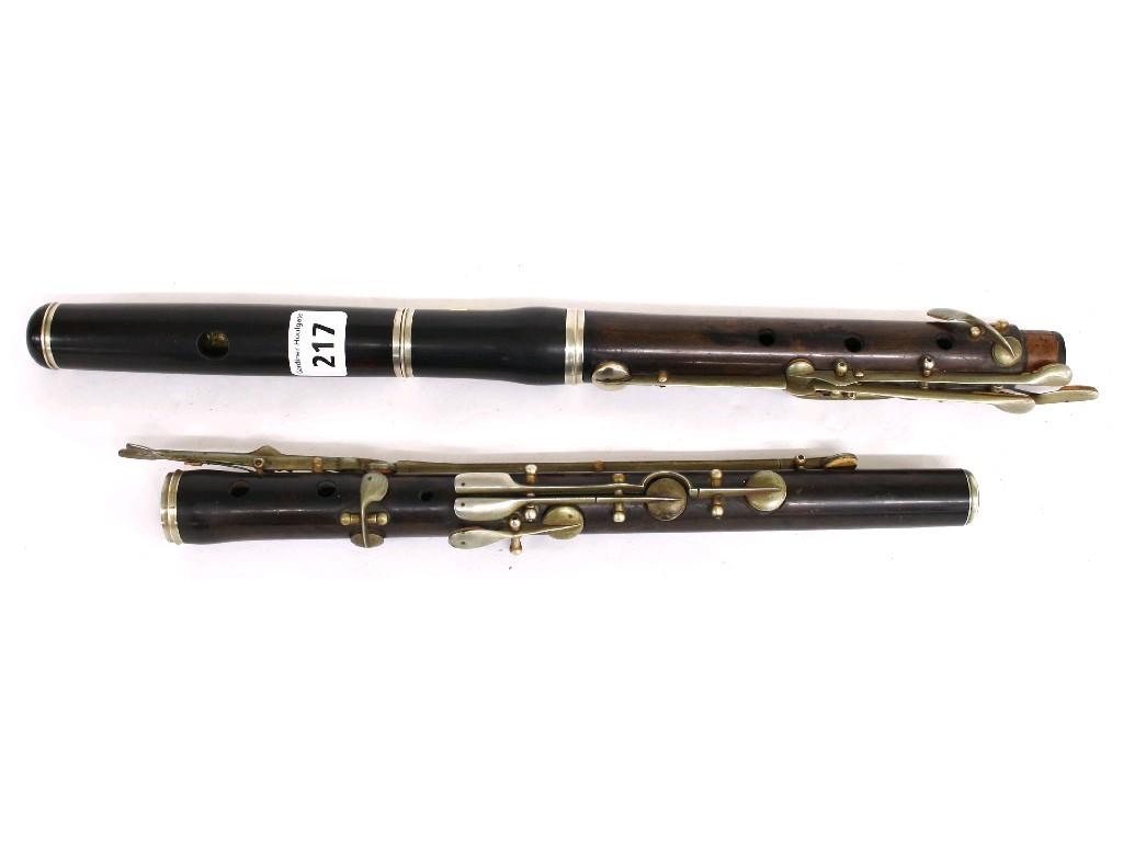 Appraisal: Viennese rosewood and nickel mounted ten key flute unstamped