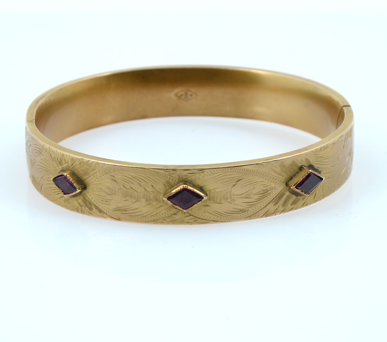 Appraisal: GRAM K BANGLE WITH AMETHYSTS '' wide hinged bangle with