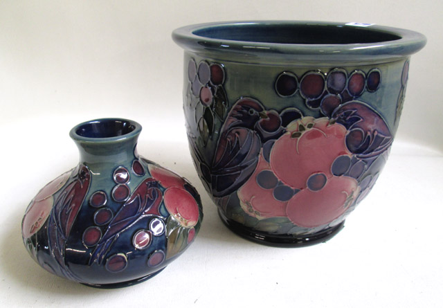 Appraisal: TWO MOORCROFT POTTERY VESSELS hand painted underglaze in the Finch