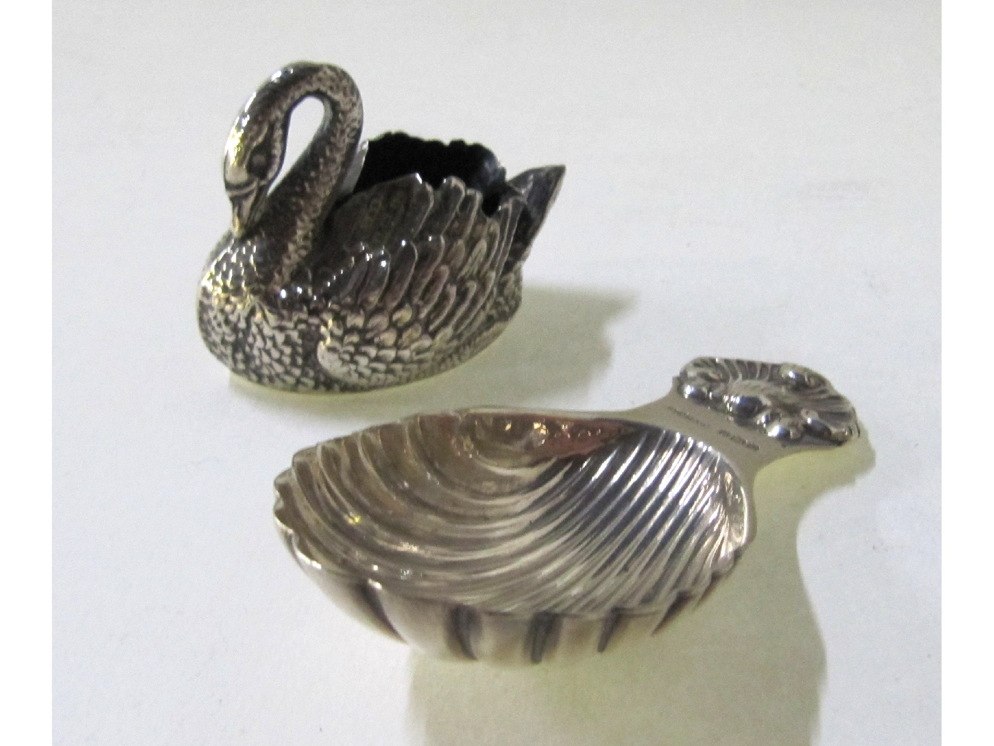 Appraisal: A lot comprising a silver 'Swan' posy holder and a