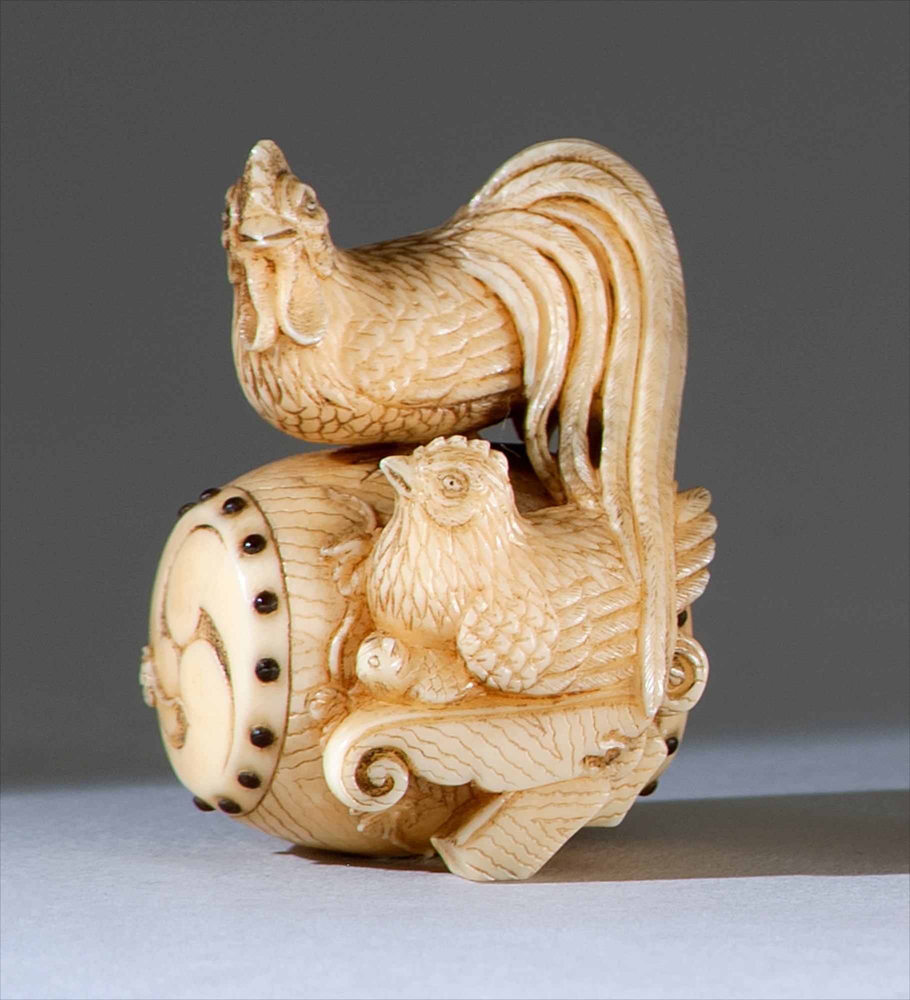 Appraisal: IVORY NETSUKE Late th CenturyBy Kojitsu In the form of